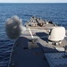 USS Ross fires its 5-inch gun