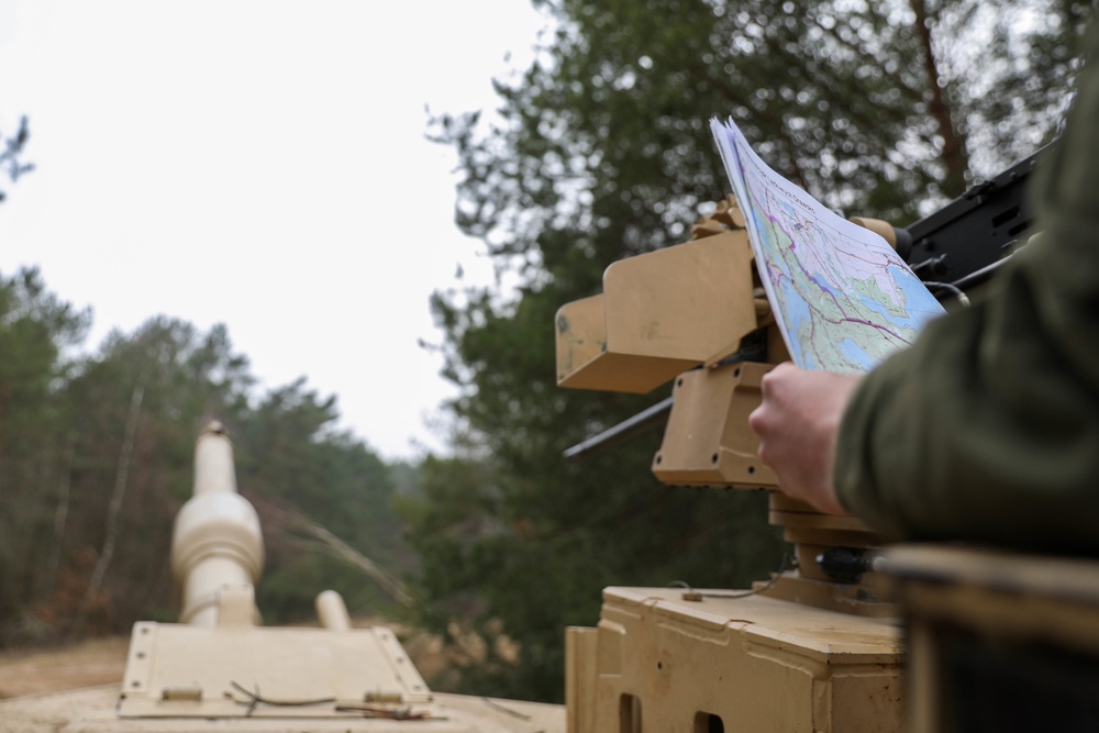 DVIDS Images Soldiers Conduct Mounted Land Navigation at DPTA Poland [Image 3 of 4]
