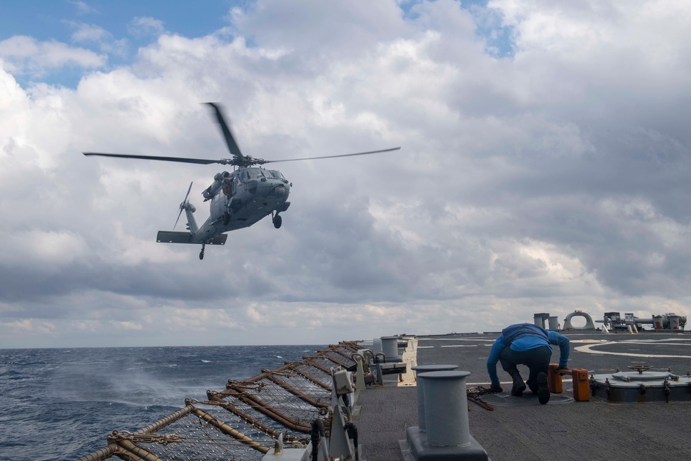 An MH-60S Sea Hawk helicopter, assigned to the “Dragonslayers” of Helicopter Sea Combat Squadron (HSC) 11, comes in for a landing