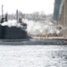 The future USS Oregon (SSN 793) arrives at Submarine Base New London