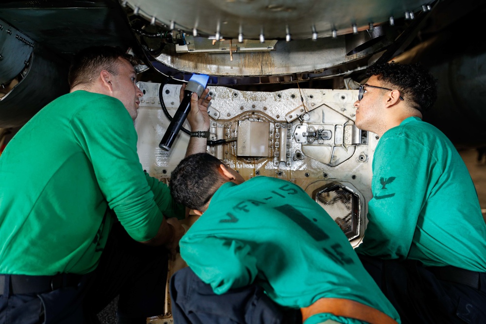 Abraham Lincoln Sailors conduct aircraft maintenance