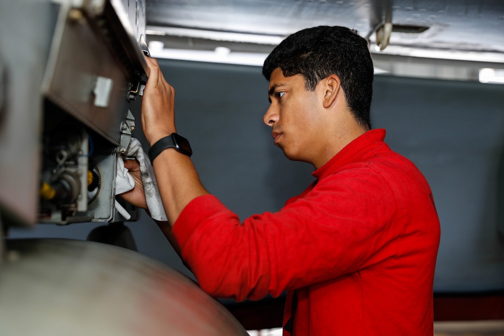 Abraham Lincoln Sailors conduct aircraft maintenance