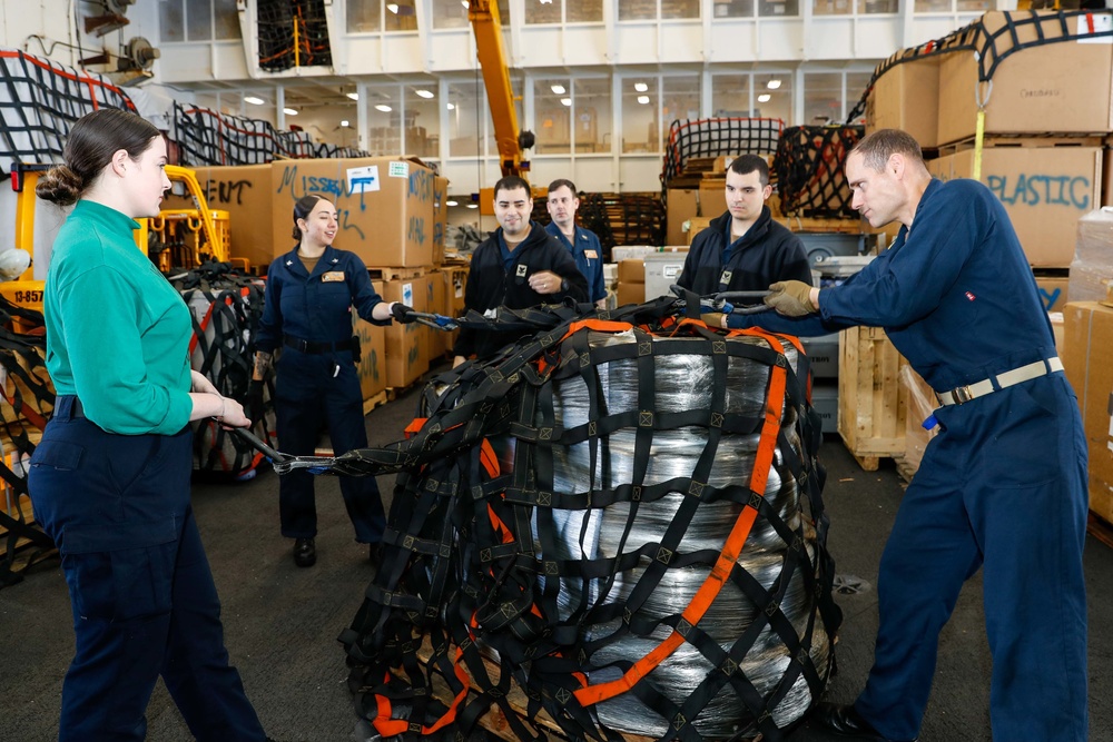 Abraham Lincoln Sailors prepare for a RAS