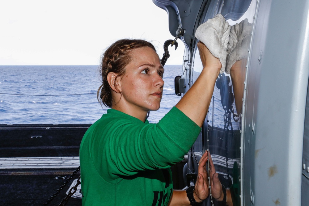 Abraham Lincoln Sailors conduct aircraft maintenance