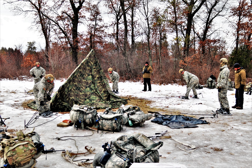 Soldiers, Airmen learn to build Arctic tents during CWOC training at Fort McCoy