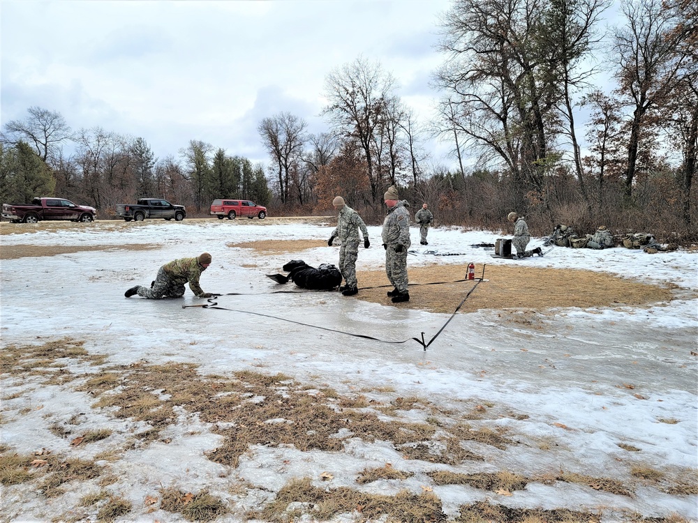 Soldiers, Airmen learn to build Arctic tents during CWOC training at Fort McCoy