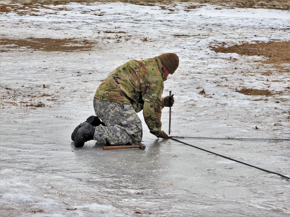 Soldiers, Airmen learn to build Arctic tents during CWOC training at Fort McCoy