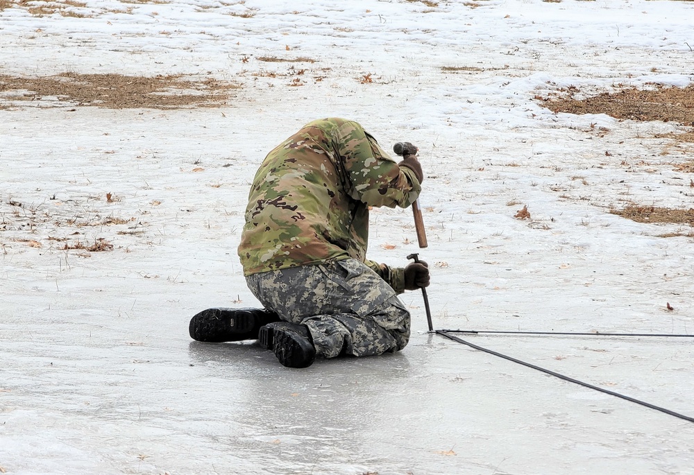 Soldiers, Airmen learn to build Arctic tents during CWOC training at Fort McCoy