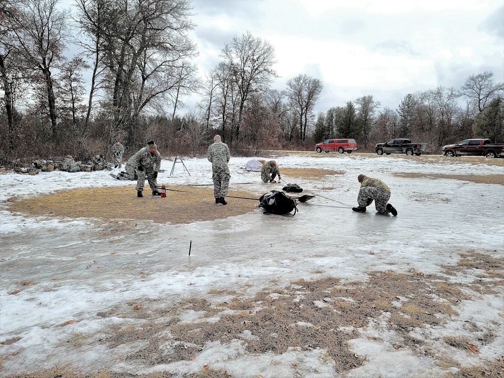 Soldiers, Airmen learn to build Arctic tents during CWOC training at Fort McCoy