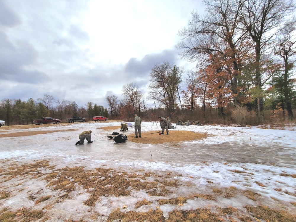 Soldiers, Airmen learn to build Arctic tents during CWOC training at Fort McCoy