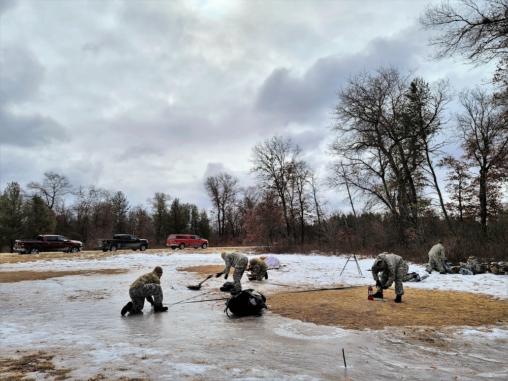 Soldiers, Airmen learn to build Arctic tents during CWOC training at Fort McCoy