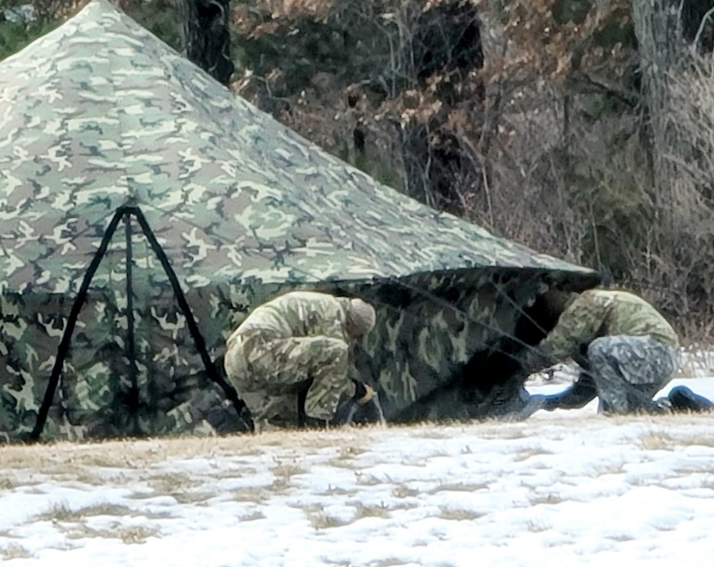 Soldiers, Airmen learn to build Arctic tents during CWOC training at Fort McCoy