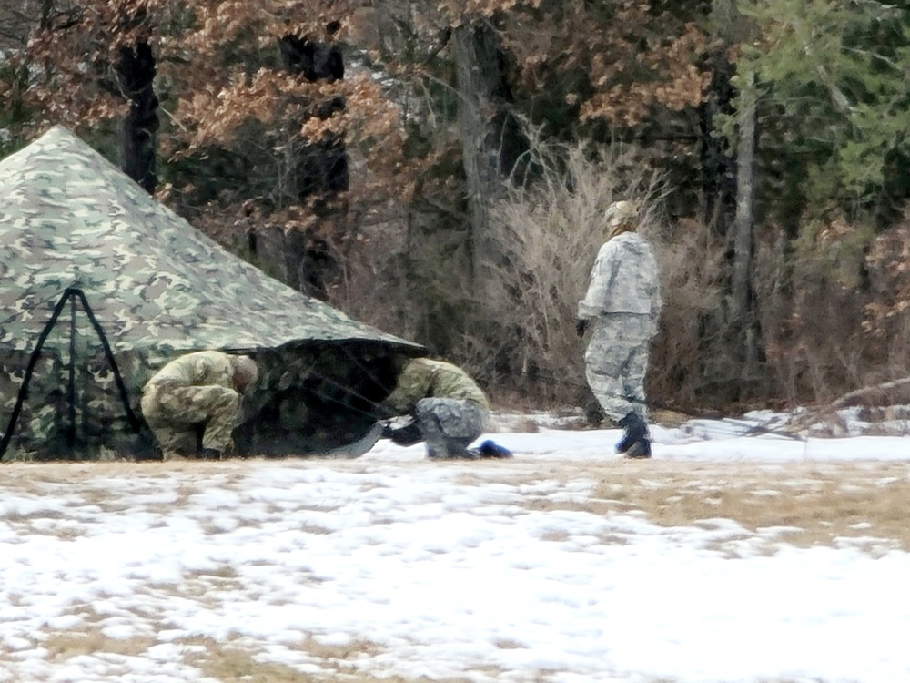 Soldiers, Airmen learn to build Arctic tents during CWOC training at Fort McCoy