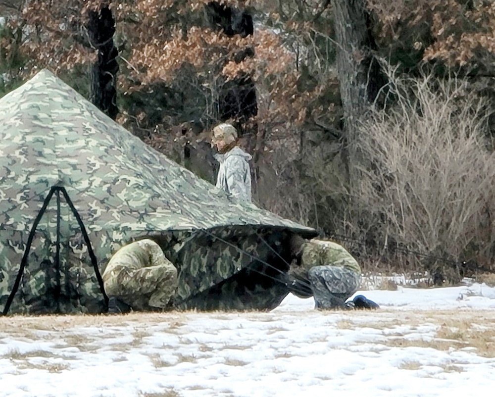 Soldiers, Airmen learn to build Arctic tents during CWOC training at Fort McCoy