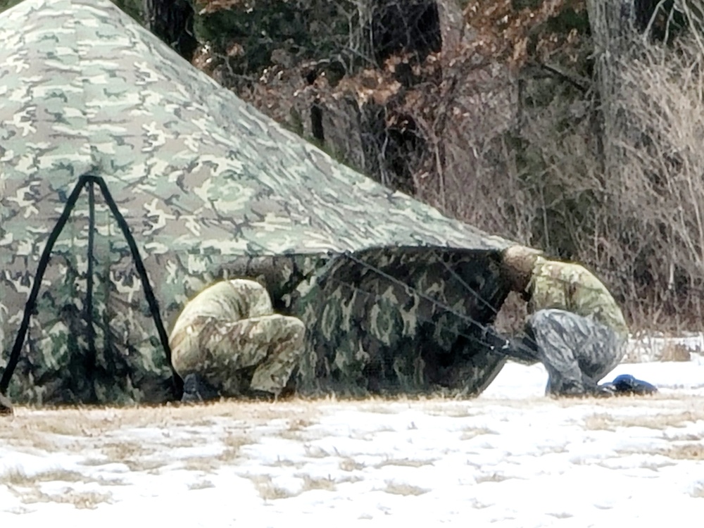 Soldiers, Airmen learn to build Arctic tents during CWOC training at Fort McCoy