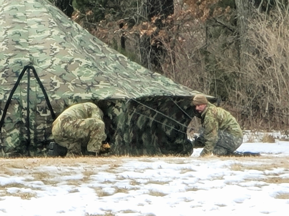 Soldiers, Airmen learn to build Arctic tents during CWOC training at Fort McCoy