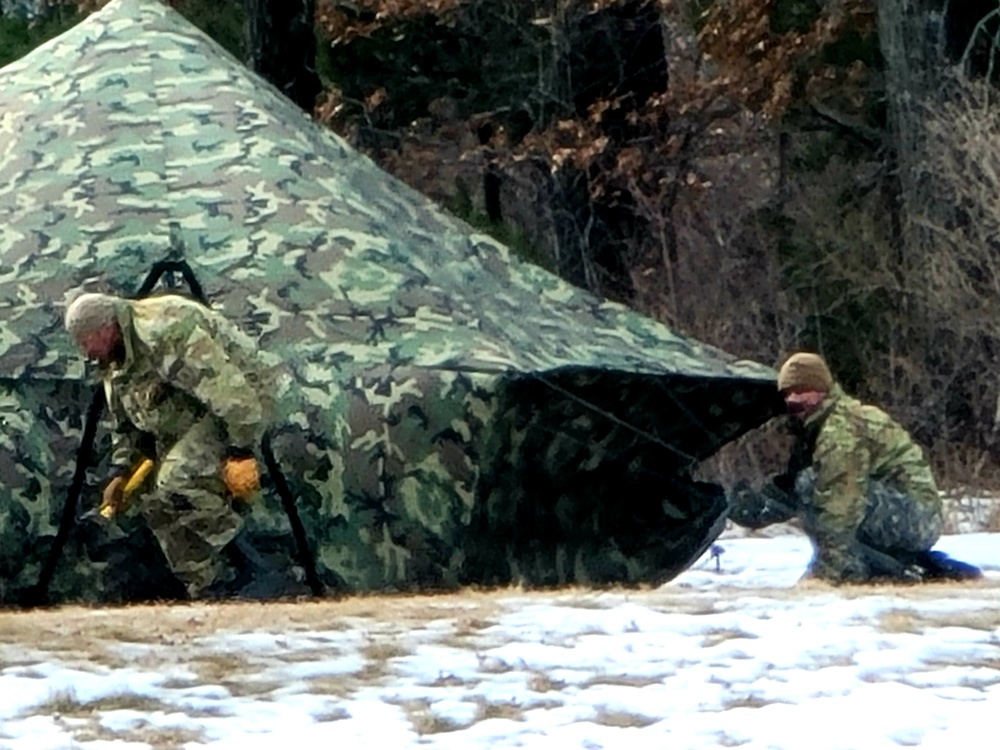 Soldiers, Airmen learn to build Arctic tents during CWOC training at Fort McCoy