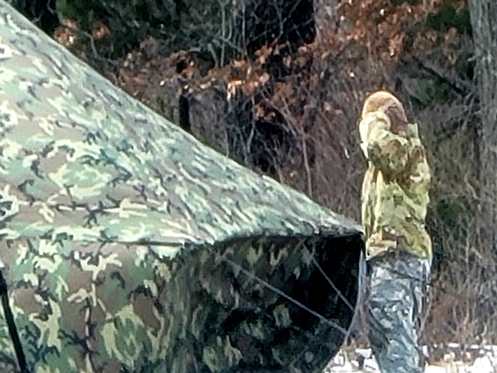 Soldiers, Airmen learn to build Arctic tents during CWOC training at Fort McCoy