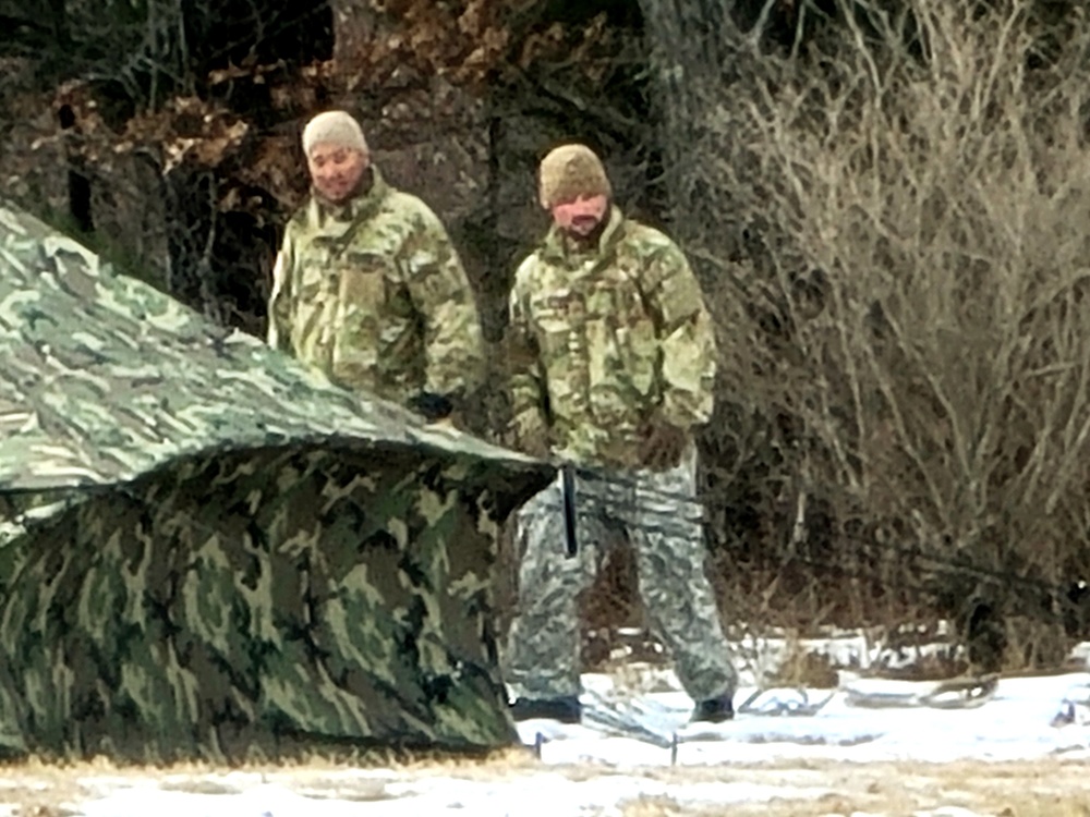 Soldiers, Airmen learn to build Arctic tents during CWOC training at Fort McCoy