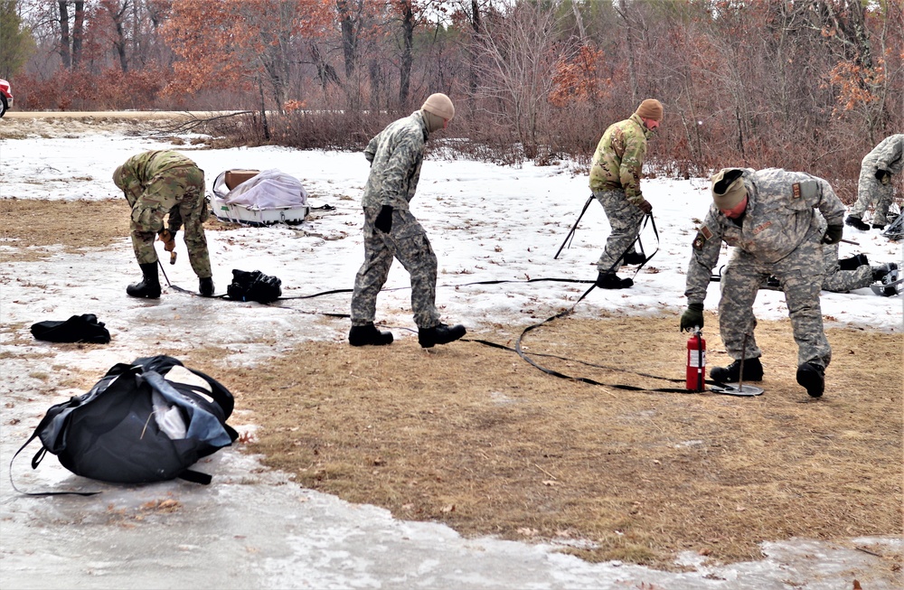 Soldiers, Airmen learn to build Arctic tents during CWOC training at Fort McCoy