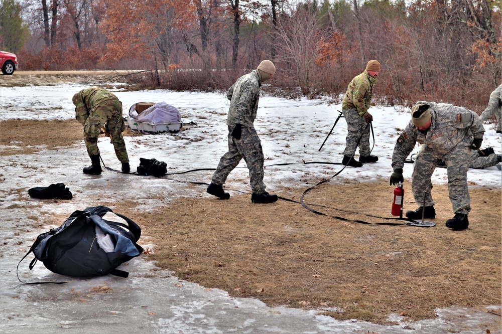 Soldiers, Airmen learn to build Arctic tents during CWOC training at Fort McCoy