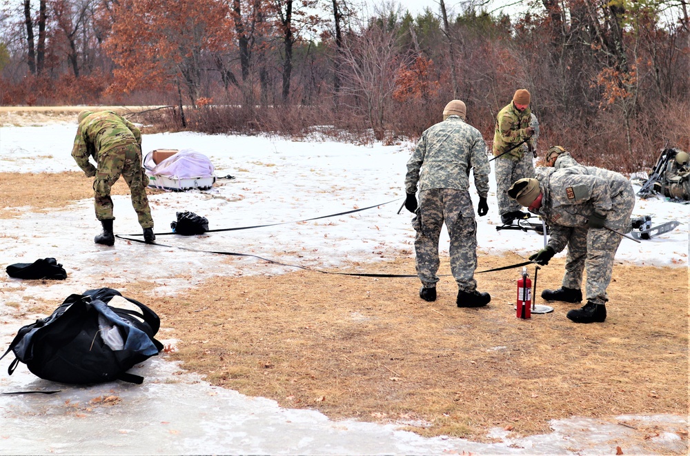 Soldiers, Airmen learn to build Arctic tents during CWOC training at Fort McCoy