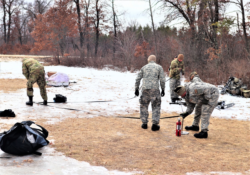 Soldiers, Airmen learn to build Arctic tents during CWOC training at Fort McCoy