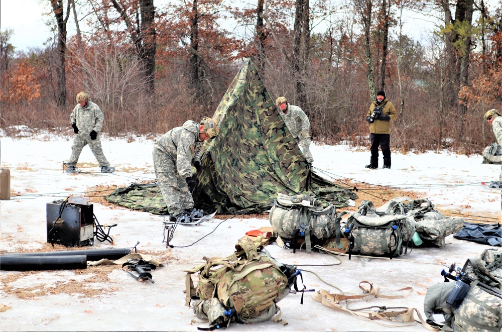 Soldiers, Airmen learn to build Arctic tents during CWOC training at Fort McCoy