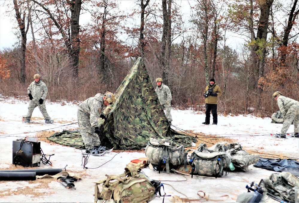 Soldiers, Airmen learn to build Arctic tents during CWOC training at Fort McCoy