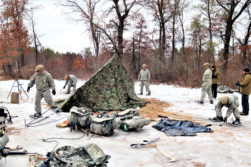 Soldiers, Airmen learn to build Arctic tents during CWOC training at Fort McCoy