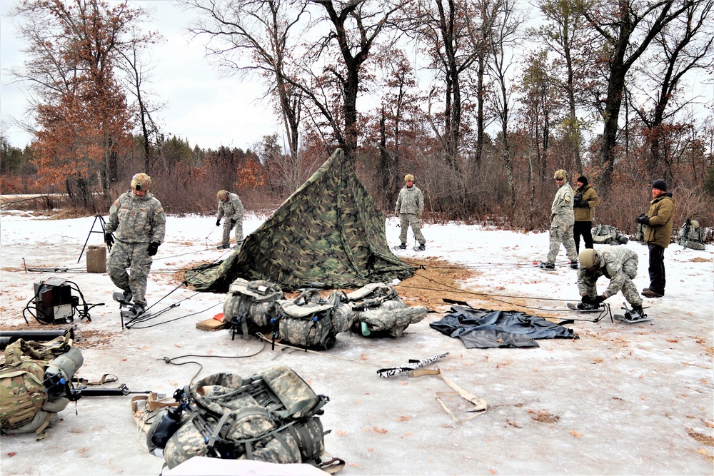 Soldiers, Airmen learn to build Arctic tents during CWOC training at Fort McCoy