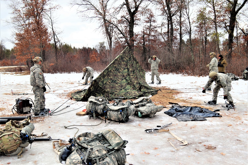 Soldiers, Airmen learn to build Arctic tents during CWOC training at Fort McCoy