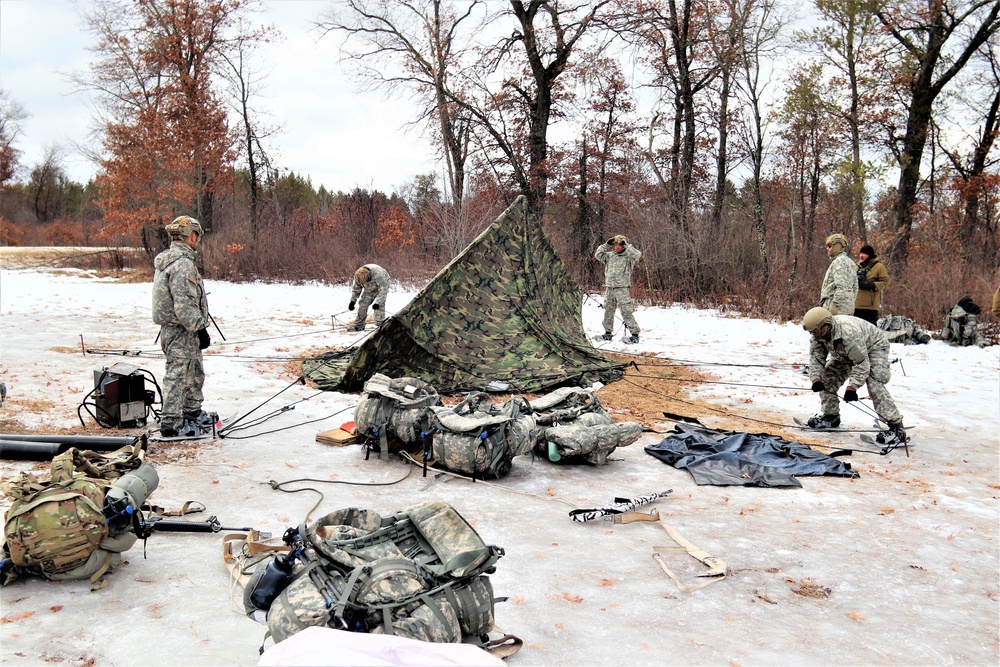 Soldiers, Airmen learn to build Arctic tents during CWOC training at Fort McCoy