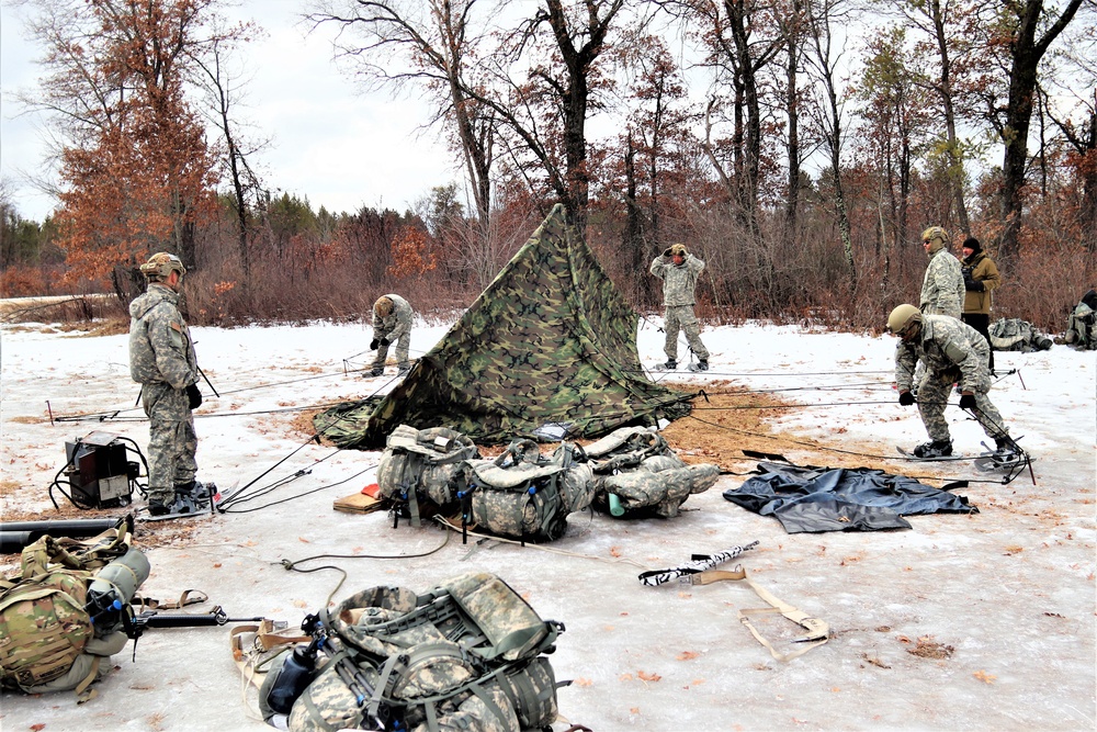 Soldiers, Airmen learn to build Arctic tents during CWOC training at Fort McCoy