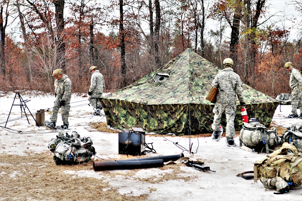 Soldiers, Airmen learn to build Arctic tents during CWOC training at Fort McCoy