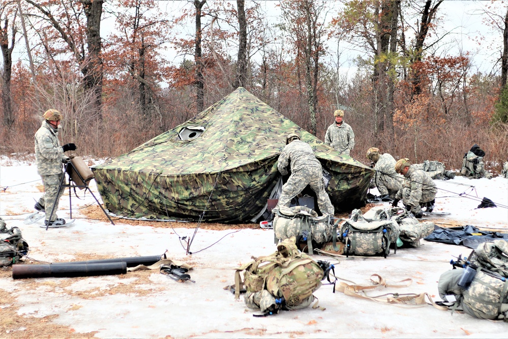 Soldiers, Airmen learn to build Arctic tents during CWOC training at Fort McCoy