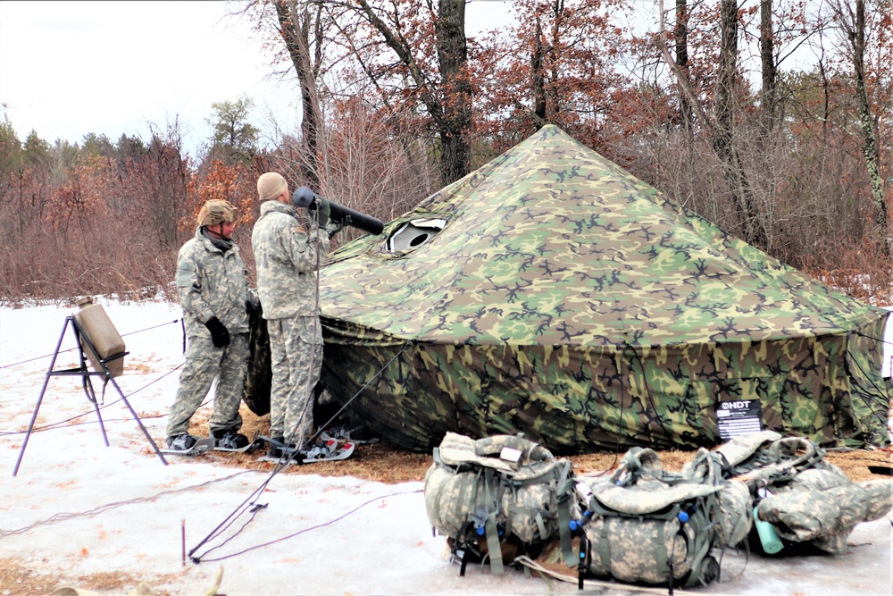 Soldiers, Airmen learn to build Arctic tents during CWOC training at Fort McCoy