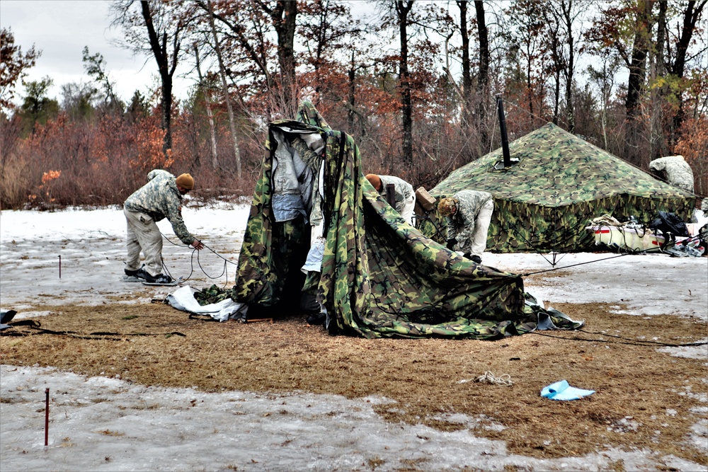 Soldiers, Airmen learn to build Arctic tents during CWOC training at Fort McCoy