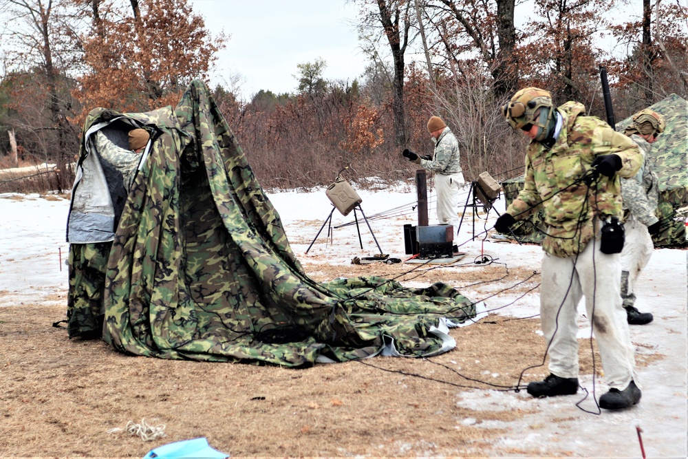 Soldiers, Airmen learn to build Arctic tents during CWOC training at Fort McCoy