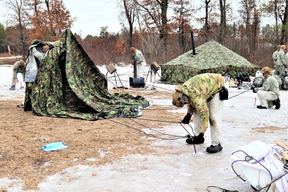 Soldiers, Airmen learn to build Arctic tents during CWOC training at Fort McCoy