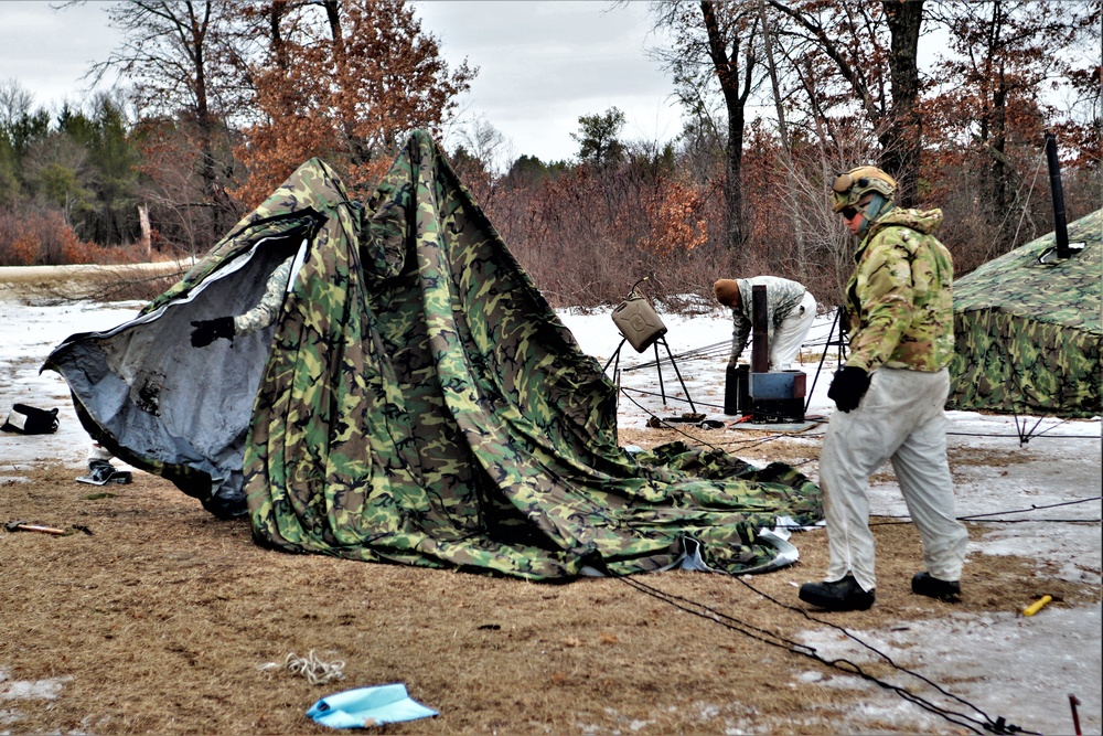 Soldiers, Airmen learn to build Arctic tents during CWOC training at Fort McCoy