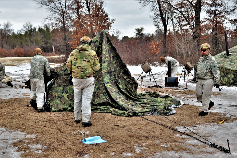 Soldiers, Airmen learn to build Arctic tents during CWOC training at Fort McCoy