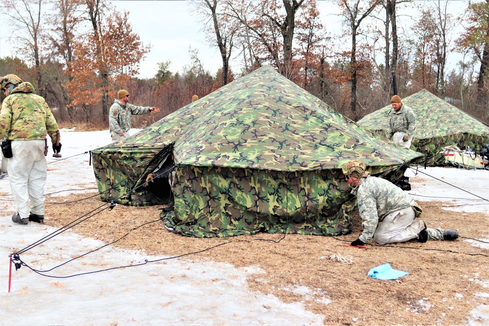 Soldiers, Airmen learn to build Arctic tents during CWOC training at Fort McCoy