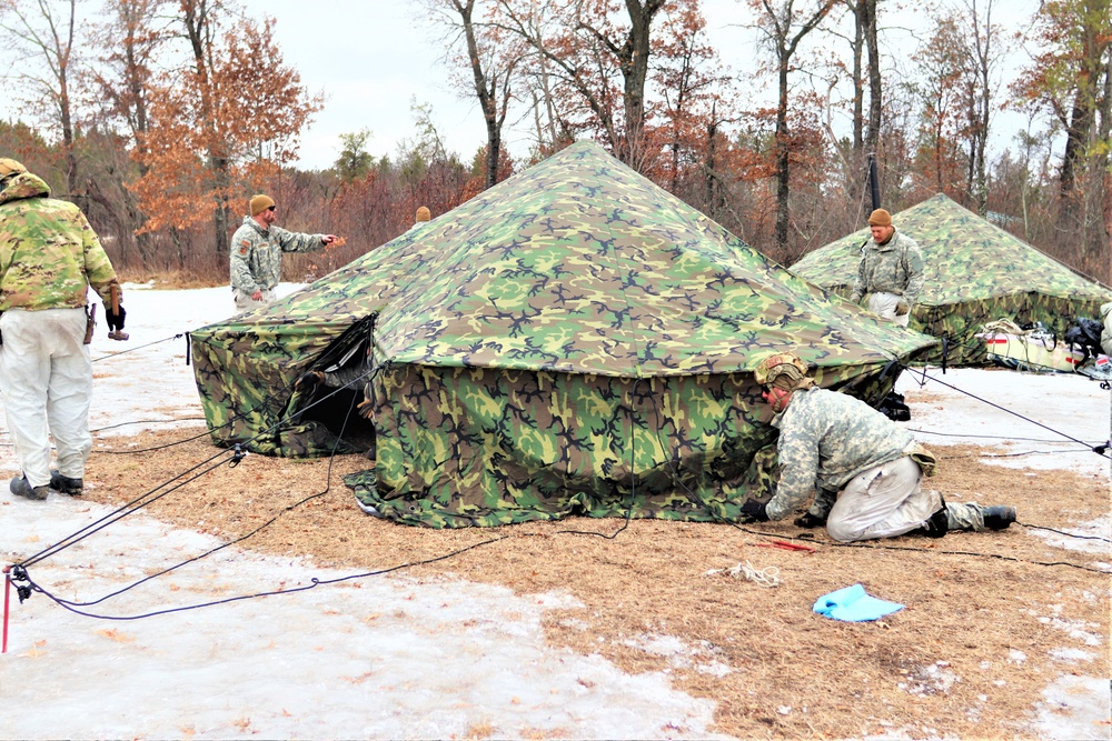 Soldiers, Airmen learn to build Arctic tents during CWOC training at Fort McCoy