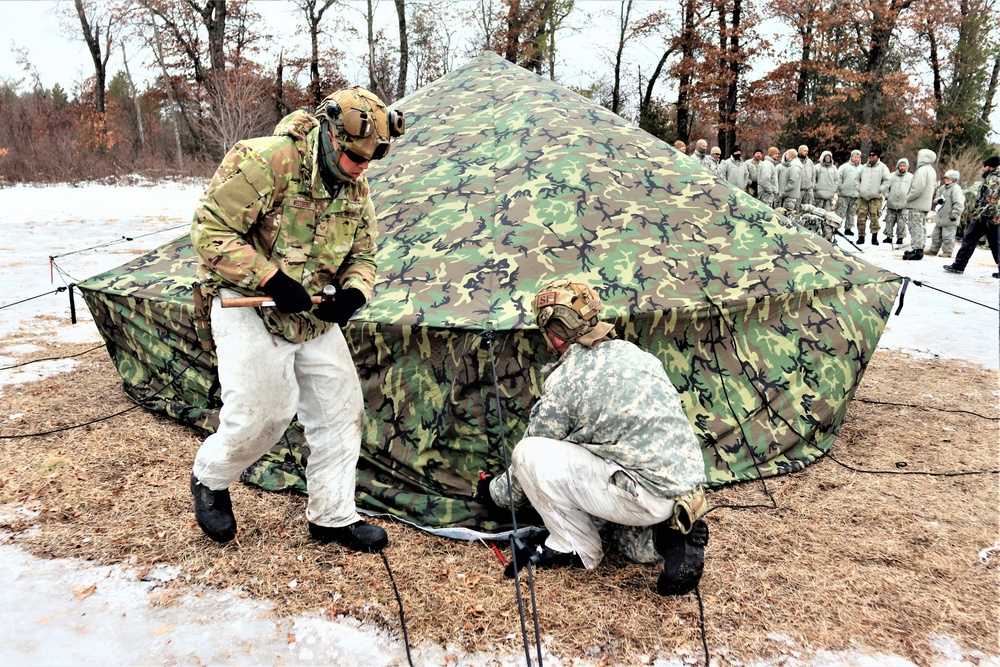 Soldiers, Airmen learn to build Arctic tents during CWOC training at Fort McCoy