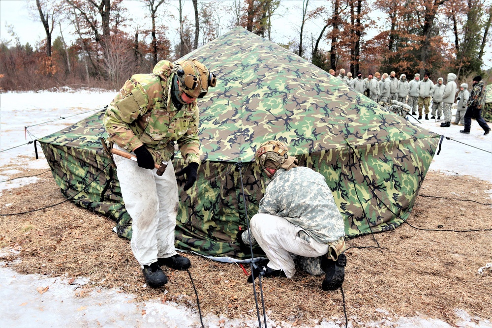 Soldiers, Airmen learn to build Arctic tents during CWOC training at Fort McCoy