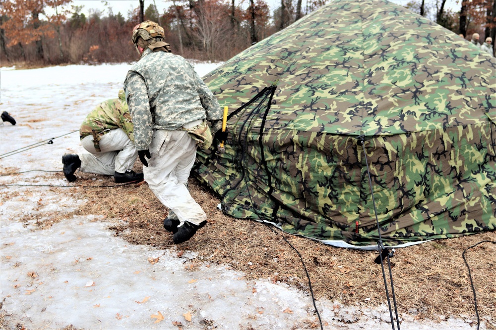 Soldiers, Airmen learn to build Arctic tents during CWOC training at Fort McCoy