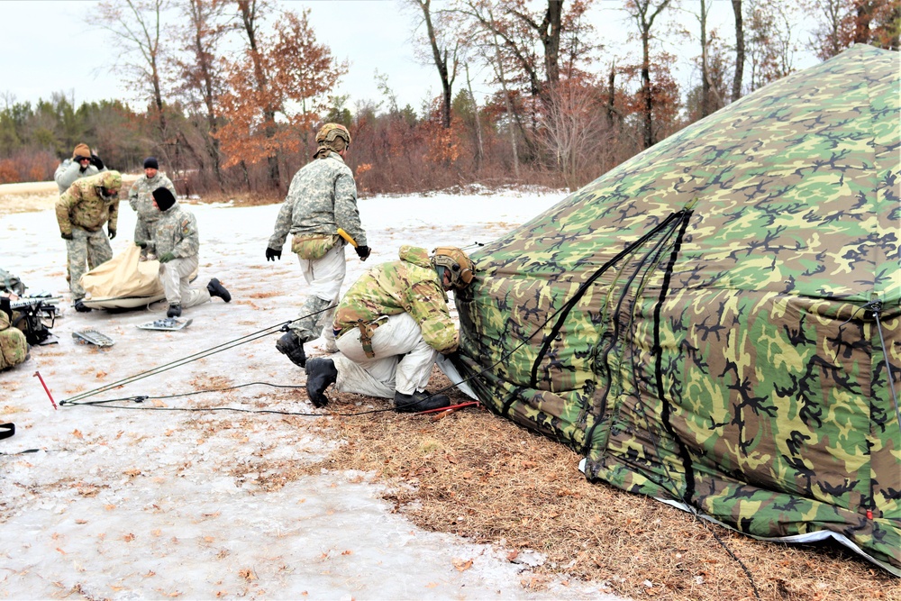 Soldiers, Airmen learn to build Arctic tents during CWOC training at Fort McCoy