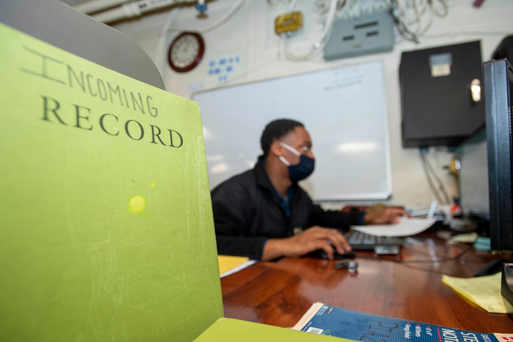 Sailor Fills Out Administration Paperwork