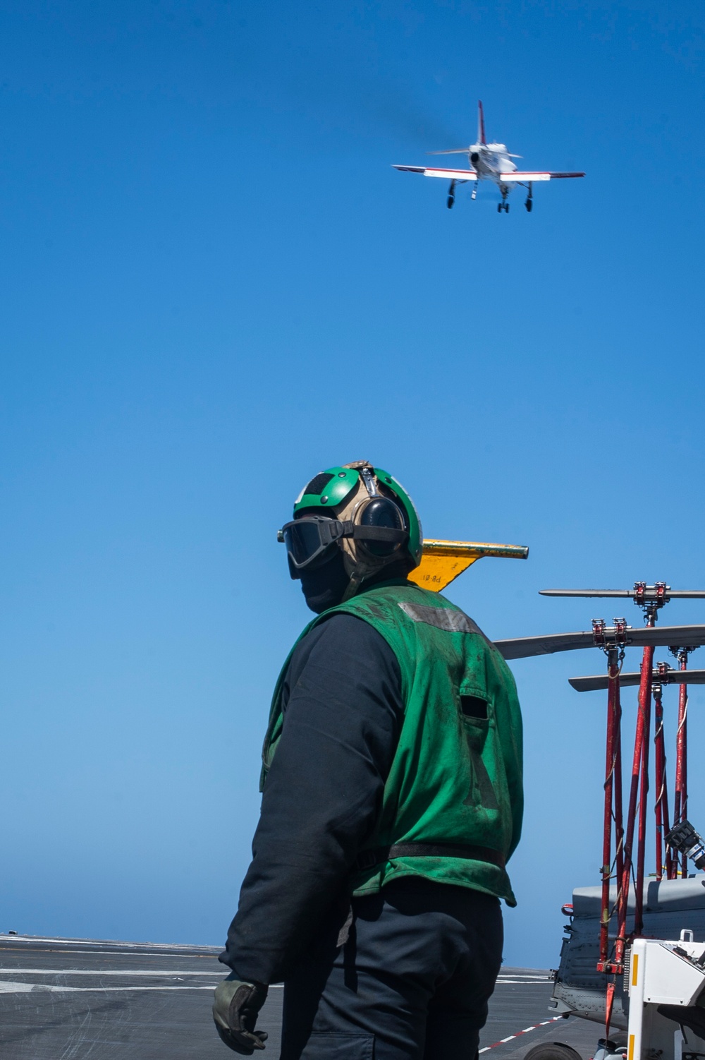 A T-45C Goshawk Flies Over The Flight Deck